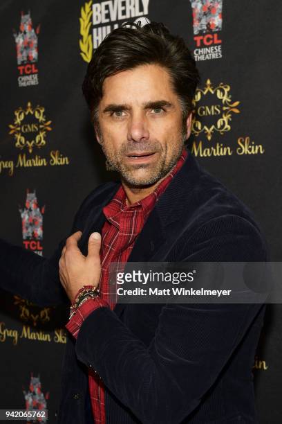 John Stamos attends the 18th Annual International Beverly Hills Film Festival Opening Night Gala Premiere of "Benjamin" at TCL Chinese 6 Theatres on...