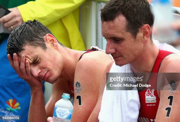 Jonathan Brownlee of England and Alistair Brownlee of England look dejected after the Men's Triathlon on day one of the Gold Coast 2018 Commonwealth...
