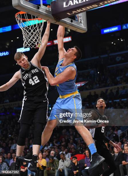 Ivica Zubac of the Los Angeles Lakers dunks against Davis Bertans of the San Antonio Spurs in the first half of the game at Staples Center on April...