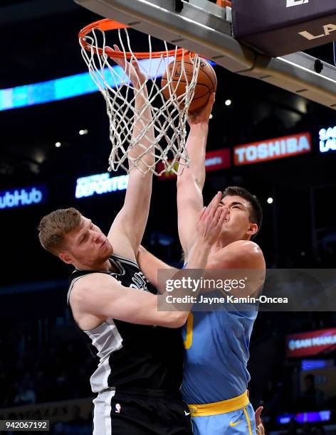 Ivica Zubac of the Los Angeles Lakers dunks against Davis Bertans of the San Antonio Spurs in the first half of the game at Staples Center on April...