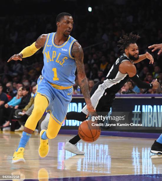 Kentavious Caldwell-Pope of the Los Angeles Lakers drives against the San Antonio Spurs in the first half of the game at Staples Center on April 4,...