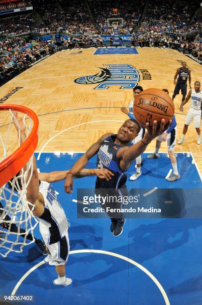 Jalen Jones of the Dallas Mavericks shoots the ball during the game against the Orlando Magic on April 4, 2018 at Amway Center in Orlando, Florida....