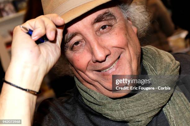 Writer Waciny Laredj poses during Paris Book Fair 2018 at Parc Des Expositions Porte de Versailles, France on