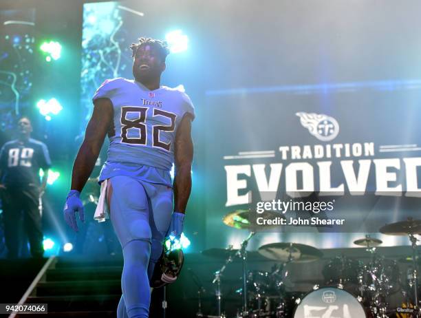 Tennessee Titan, Delanie Walker, shows off new uniform during The NFL's Tennessee Titans team up for the "Tradition Evolved" concert event in...