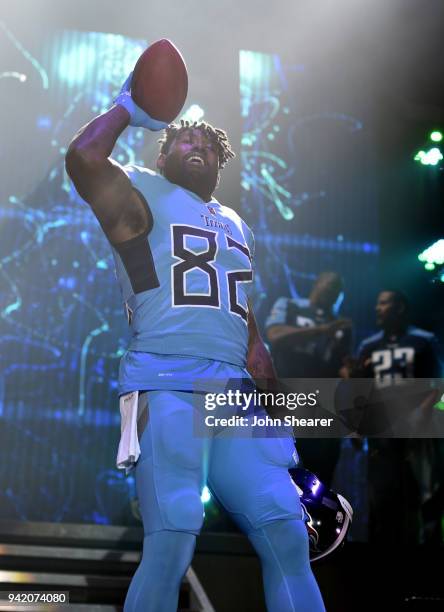 Tennessee Titan, Delanie Walker, shows off new uniform during The NFL's Tennessee Titans team up for the "Tradition Evolved" concert event in...