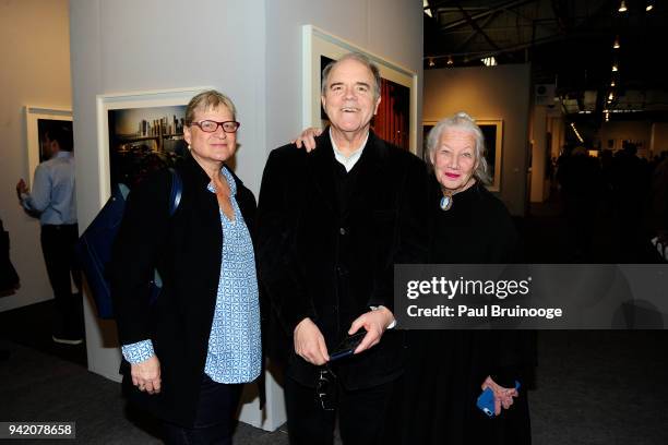 April 4: Temple Richardson, W. M. Hunt and Marcia Lippmann attend The Photography Show presented by AIPAD - Vernissage at Pier 94 on April 4, 2018 in...