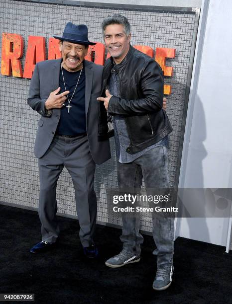 Danny Trejo;Esai Morales arrives at the Premiere Of Warner Bros. Pictures' "Rampage" at Microsoft Theater on April 4, 2018 in Los Angeles, California.