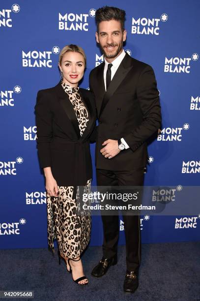 Karla Guindi and Erick Elias attend Montblanc Celebrates "Le Petit Prince" at the One World Trade Center Observatory on April 4, 2018 in New York...