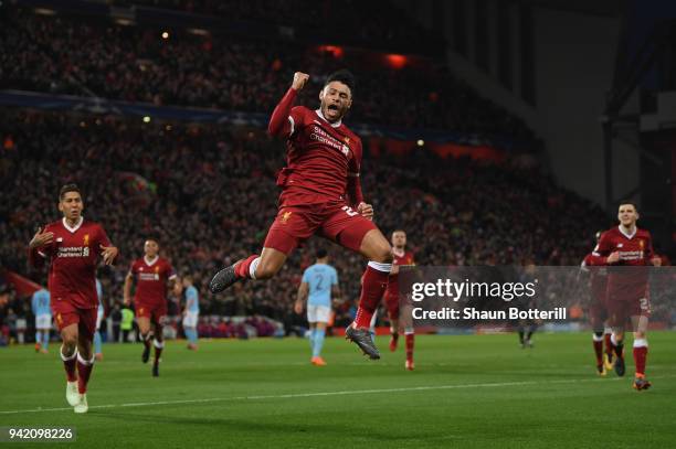 Alex Oxlade-Chamberlain of Liverpool celebrates after scoring his sides second goal during the UEFA Champions League Quarter Final Leg One match...