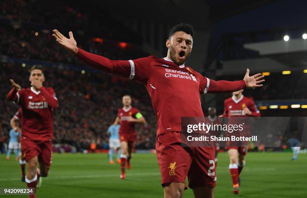 Alex Oxlade-Chamberlain of Liverpool celebrates after scoring his sides second goal during the UEFA Champions League Quarter Final Leg One match...