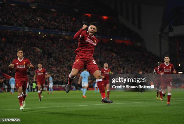 Alex Oxlade-Chamberlain of Liverpool celebrates after scoring his sides second goal during the UEFA Champions League Quarter Final Leg One match...