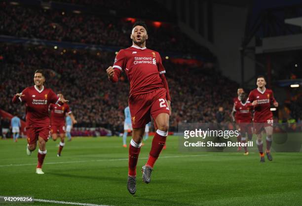 Alex Oxlade-Chamberlain of Liverpool celebrates after scoring his sides second goal during the UEFA Champions League Quarter Final Leg One match...