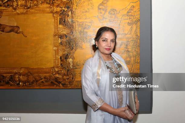 Bollywood actor Shabana Azmi during an ongoing exhibition 'Hashiya - The Margin' by Anant Art Gallery at Bikaner House, on March 30, 2018 in New...