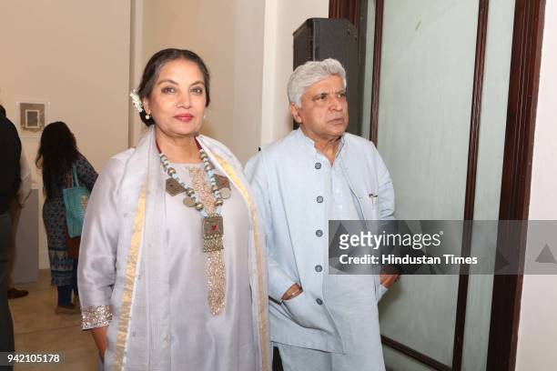 Bollywood actor Shabana Azmi with her husband and lyricist-writer Javed Akhtar during an ongoing exhibition 'Hashiya - The Margin' by Anant Art...