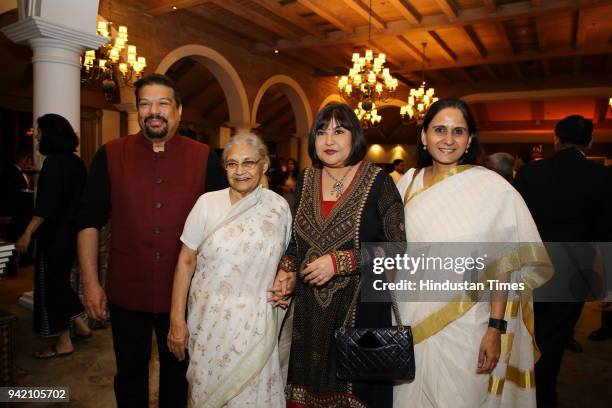Former Delhi Chief Minister Sheila Dixit, columnist and author Seema Goswami with journalist Vir Sanghvi during the launch of her book "Race Course...