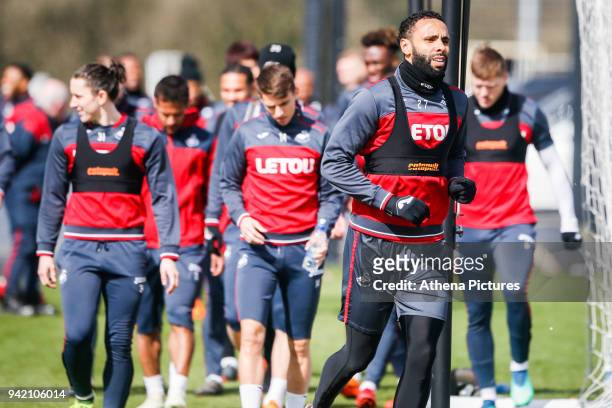Kyle Bartley leads team mates to the pitch during the Swansea City Training at The Fairwood Training Ground on April 4, 2018 in Swansea, Wales.