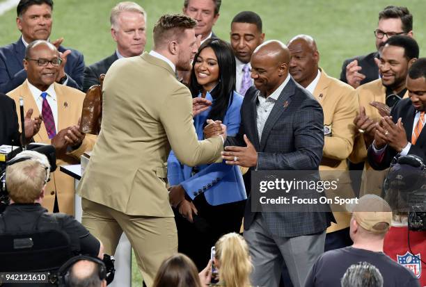 Watt with the Walter Payton Man of the Year Award on the field prior to the start of Super Bowl LII between the Philadelphia Eagles and New England...