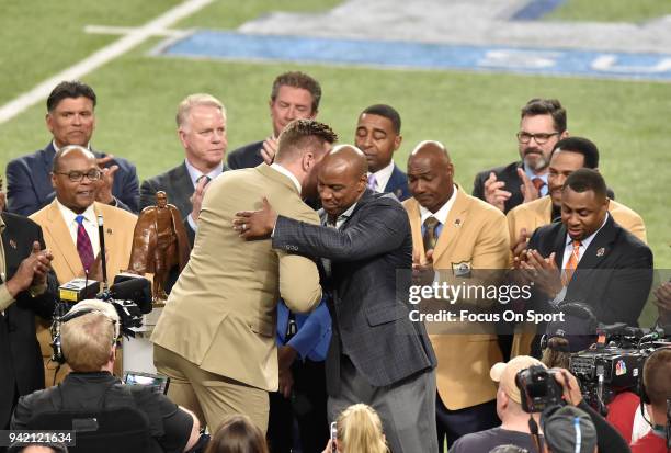 Watt with the Walter Payton Man of the Year Award on the field prior to the start of Super Bowl LII between the Philadelphia Eagles and New England...