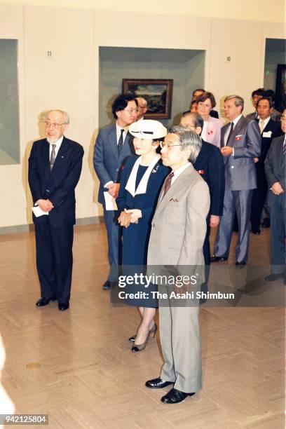 Emperor Akihito and Empress Michiko attend the Pieter Bruegel the Elder exhibition at the National Museum of Western Art on May 7, 1990 in Tokyo,...