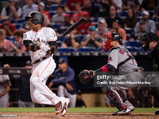 Starlin Castro of the Miami Marlins at bat during the game against the Boston Red Sox at Marlins Park on April 3, 2018 in Miami, Florida. Starlin...