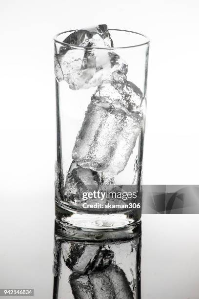 selective focus drink alcohol and water glass with whisky and sparking water and ice cube - whiskey tasting stock pictures, royalty-free photos & images