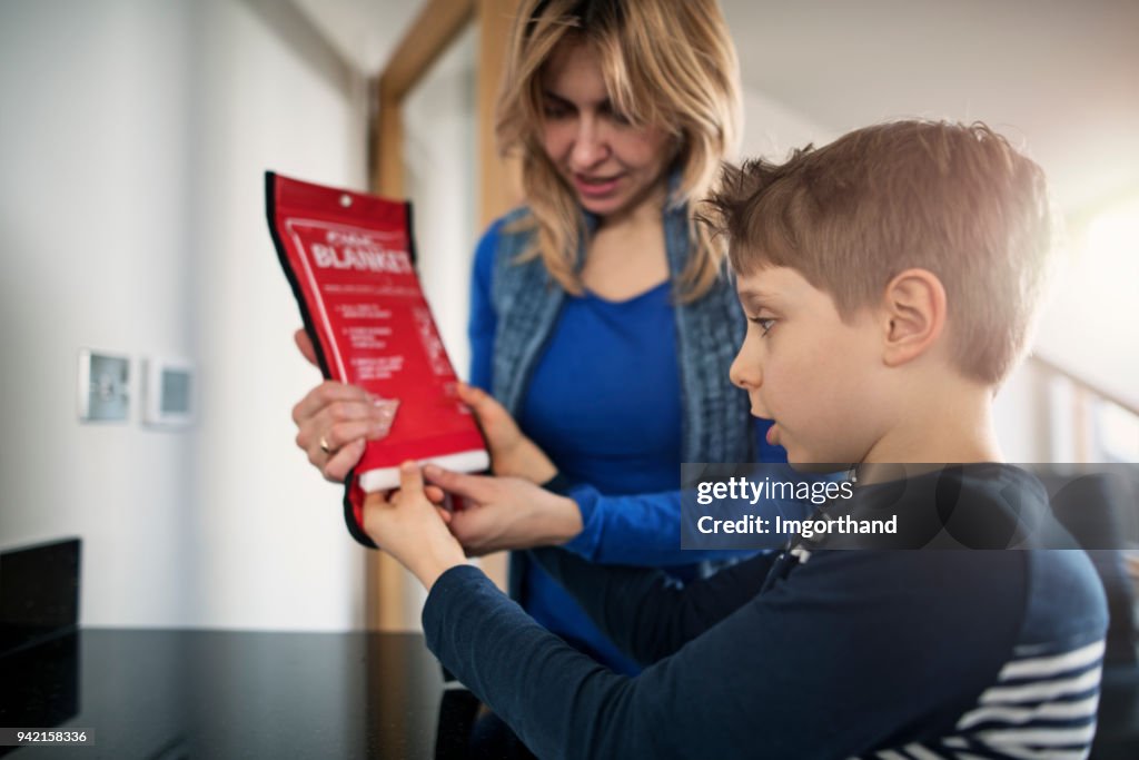 Mother explaining fire to her son