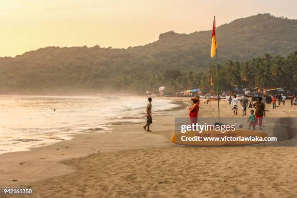 palolem beach at sunset - palolem beach stock pictures, royalty-free photos & images