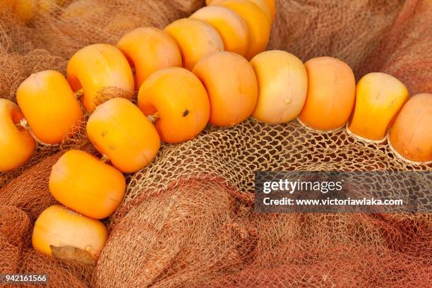 orange fishing net - palolem beach stock pictures, royalty-free photos & images