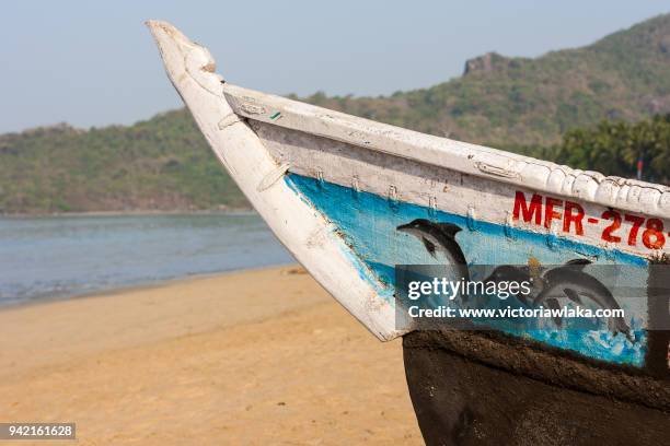 bow of a fishing boat in palolem beach - palolem beach stock pictures, royalty-free photos & images