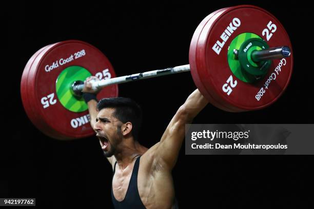 Talha Talib of Pakistan competes during the Weightlifting Men's 62kg Final on day one of the Gold Coast 2018 Commonwealth Games at Carrara Sports and...