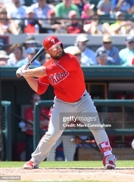 Cameron Rupp of the Philadelphia Phillies bats during the Spring Training game against the Detroit Tigers at Publix Field at Joker Marchant Stadium...