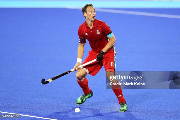 Lewis Prosser of Wales looks to pass during the Mens Pool B Hockey match between Pakistan and Wales on day one of the Gold Coast 2018 Commonwealth...