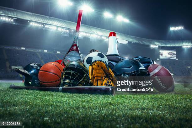 sports balls on the field with yard line. soccer ball, american football and baseball in yellow glove on green grass. outdoors - competition stock pictures, royalty-free photos & images
