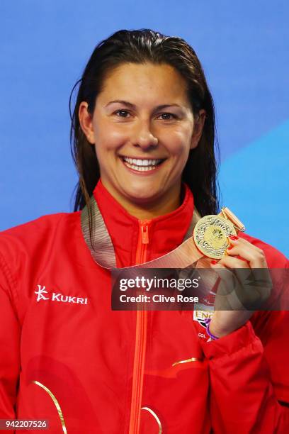 Gold medalist Aimee Willmott of England poses during the medal ceremony for the Women's 400m Individual Medley Final on day one of the Gold Coast...