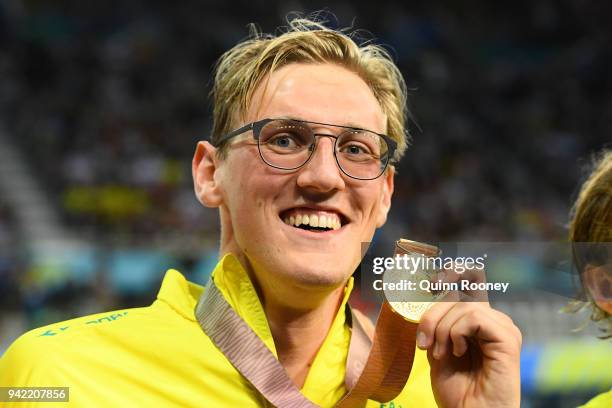 Gold medalist Mack Horton of Australia poses during the medal ceremony for the Men's 400m Freestyle Final on day one of the Gold Coast 2018...