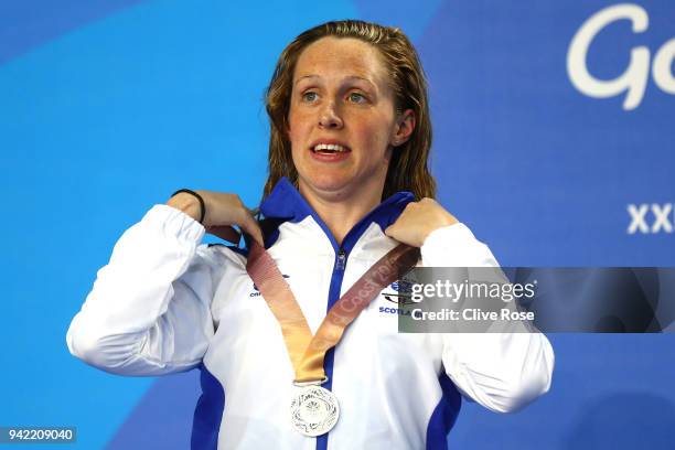 Silver medalist Hannah Miley of Scotland poses during the medal ceremony for the Women's 400m Individual Medley Final on day one of the Gold Coast...