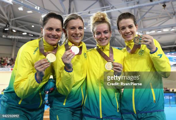 Gold medalists Ashlee Ankudinoff, Amy Cure, Annette Edmondson and Alexandra Manly of Australia celebrate during the medal ceremony for the Women's...