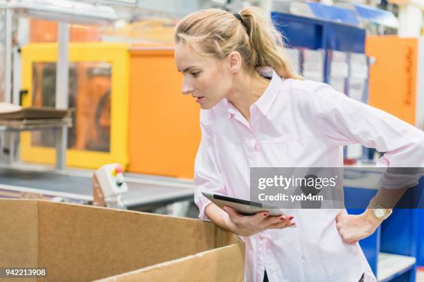 wrong packaging at factory - wrong package stock pictures, royalty-free photos & images