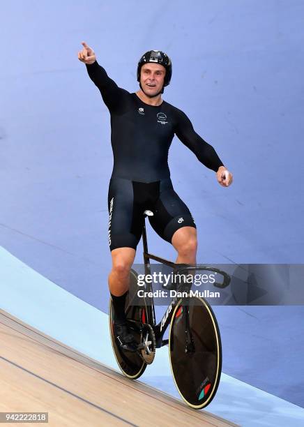 Edward Dawkins of New Zealand celebrates winning gold in the Men's Team Sprint Finals during the Cycling on day one of the Gold Coast 2018...