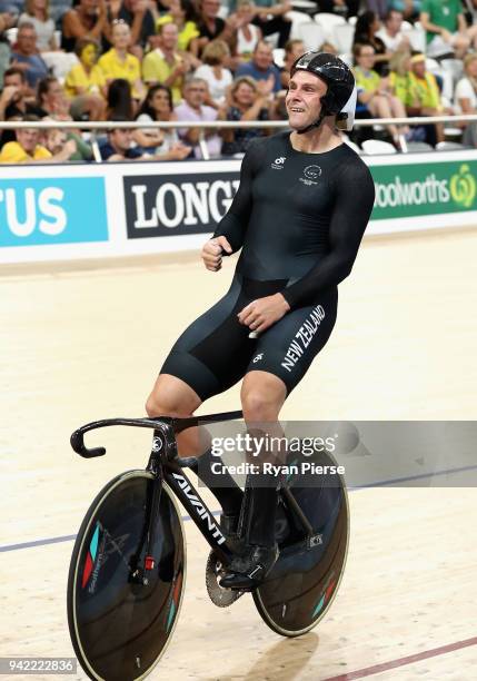 Edward Dawkins of New Zealand celebrates winning gold in the Men's Team Sprint Finals during the Cycling on day one of the Gold Coast 2018...