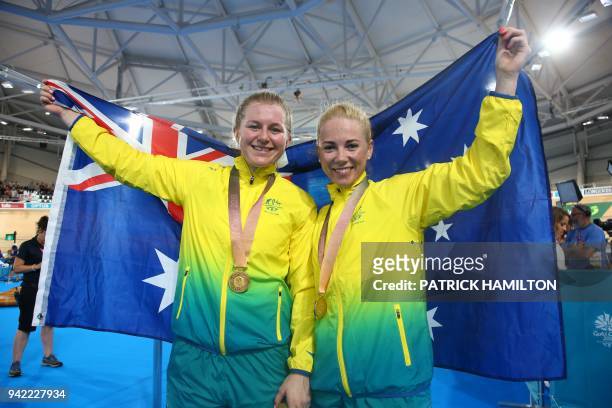 Australia's Stephanie Morton and teammate Kaarle Mcculloch celebrate their gold medal wins in the women's team sprint finals track cycling event...