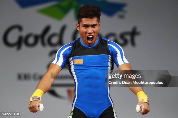 Muhamad Aznil Bidin of Malaysia celebrates after winning the gold medal in the Weightlifting Men's 62kg Final on day one of the Gold Coast 2018...