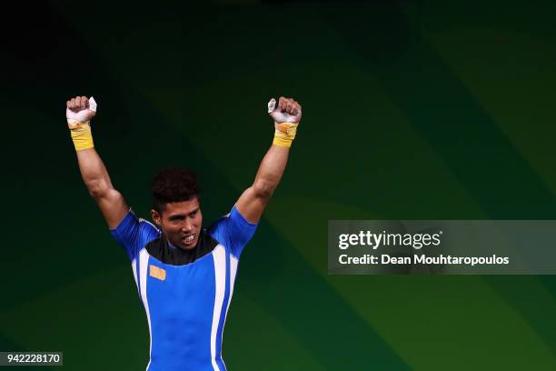 Muhamad Aznil Bidin of Malaysia celebrates after winning the gold medal in the Weightlifting Men's 62kg Final on day one of the Gold Coast 2018...