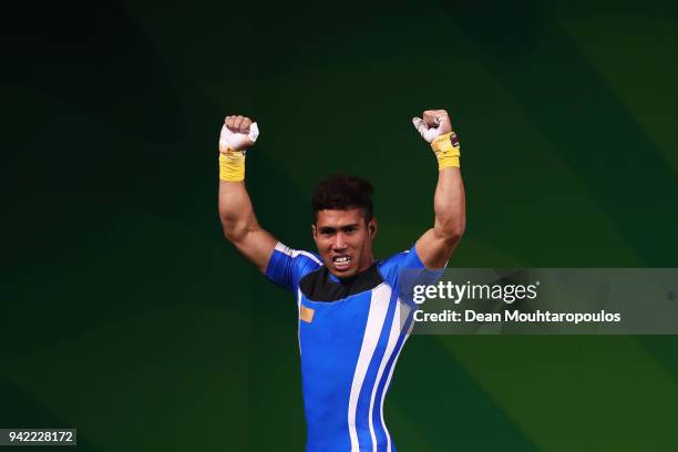 Muhamad Aznil Bidin of Malaysia celebrates after winning the gold medal in the Weightlifting Men's 62kg Final on day one of the Gold Coast 2018...