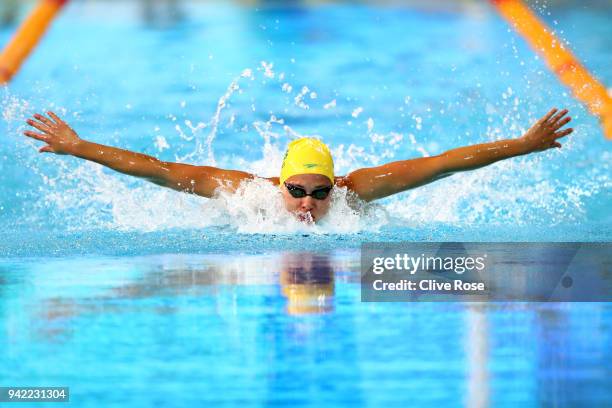 Madeline Groves of Australia competes during the Women's 100m Butterfly Semifinal 2 on day one of the Gold Coast 2018 Commonwealth Games at Optus...