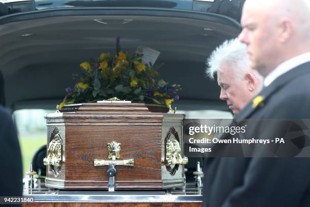 The coffin of Cardinal Keith O'Brien arrives for his funeral at the Church of St Michael in Newcastle.