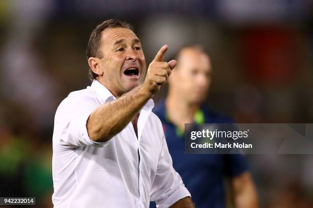 Raiders coach Ricky Stuart talks to his players during the round five NRL match between the Canberra Raiders and the Canterbury Bulldogs at GIO...