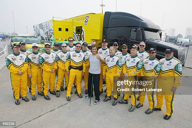 Alex Zanardi stands with the Simple Green Safety Team, on July 6, 2002 that helped him survive his accident at the American Memorial race in Germany...