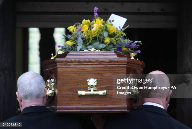 The coffin of Cardinal Keith O'Brien arrives for his funeral at the Church of St Michael in Newcastle.