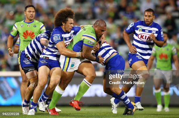 Junior Paulo of the Raiders runs the ball during the round five NRL match between the Canberra Raiders and the Canterbury Bulldogs at GIO Stadium on...